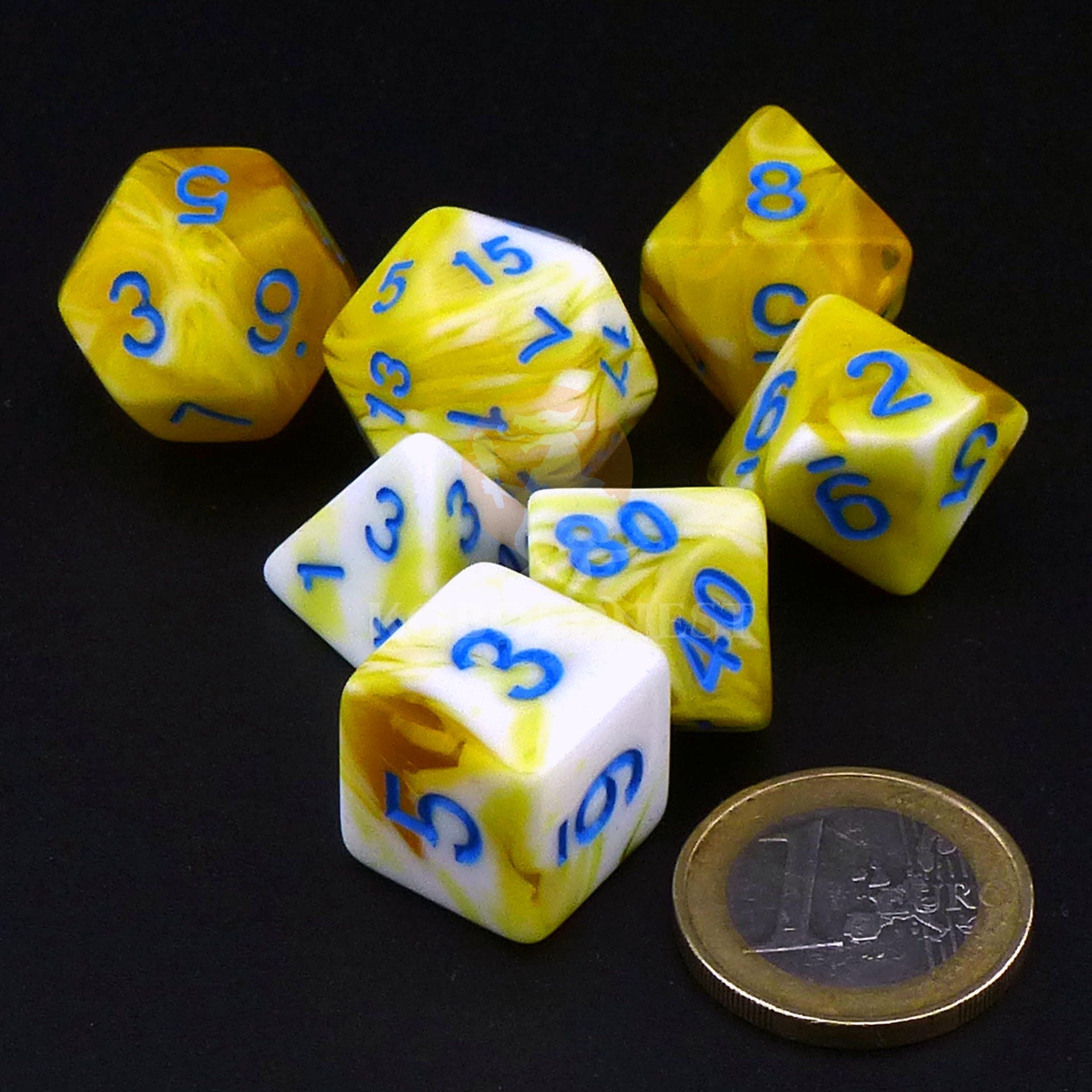 Dice_Polyhedral_Set_Standard_Yellow-White_Heap_Scale.png